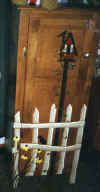 cabinet with fence and bird house.JPG (10161 bytes)